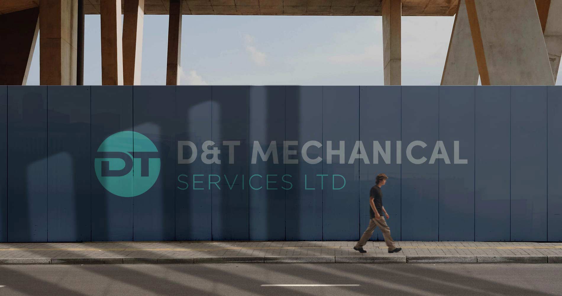 A large billboard advertising D&T Mechanical Services Logo design