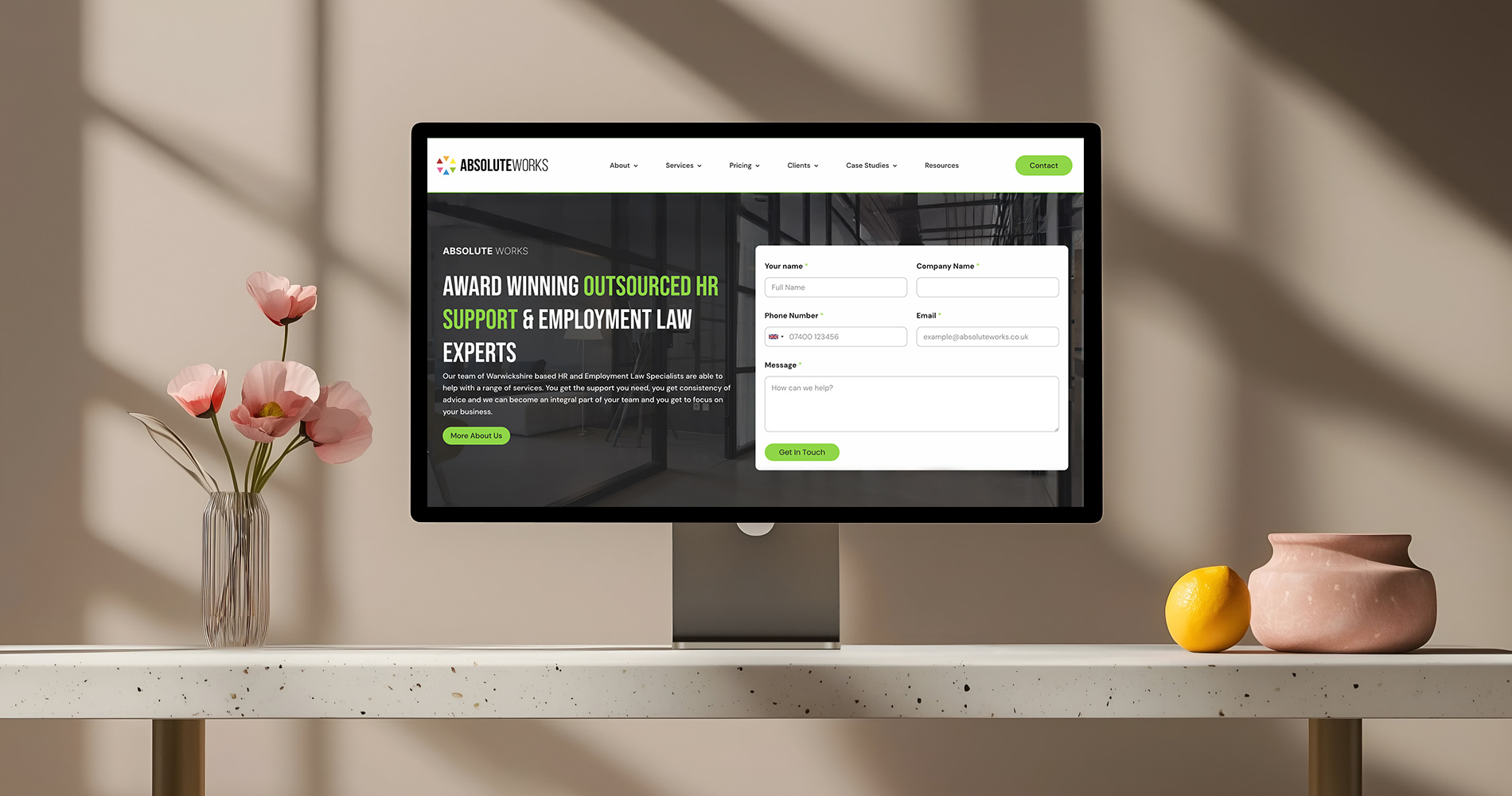 Absolute Works Website Mockup on a Desktop